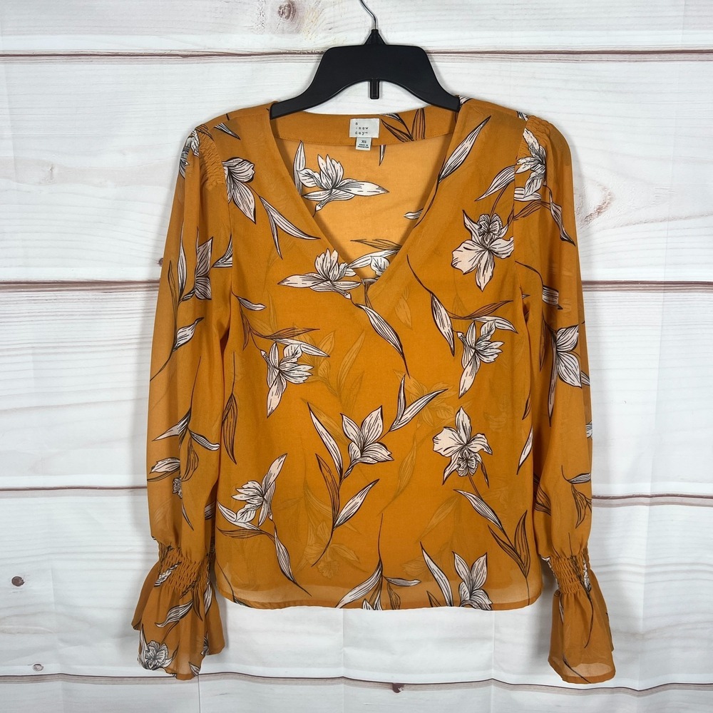 A New Day Top Womens XS Yellow Sheer‎ Floral Blouse V-Neck Smocked Cuff Pullover